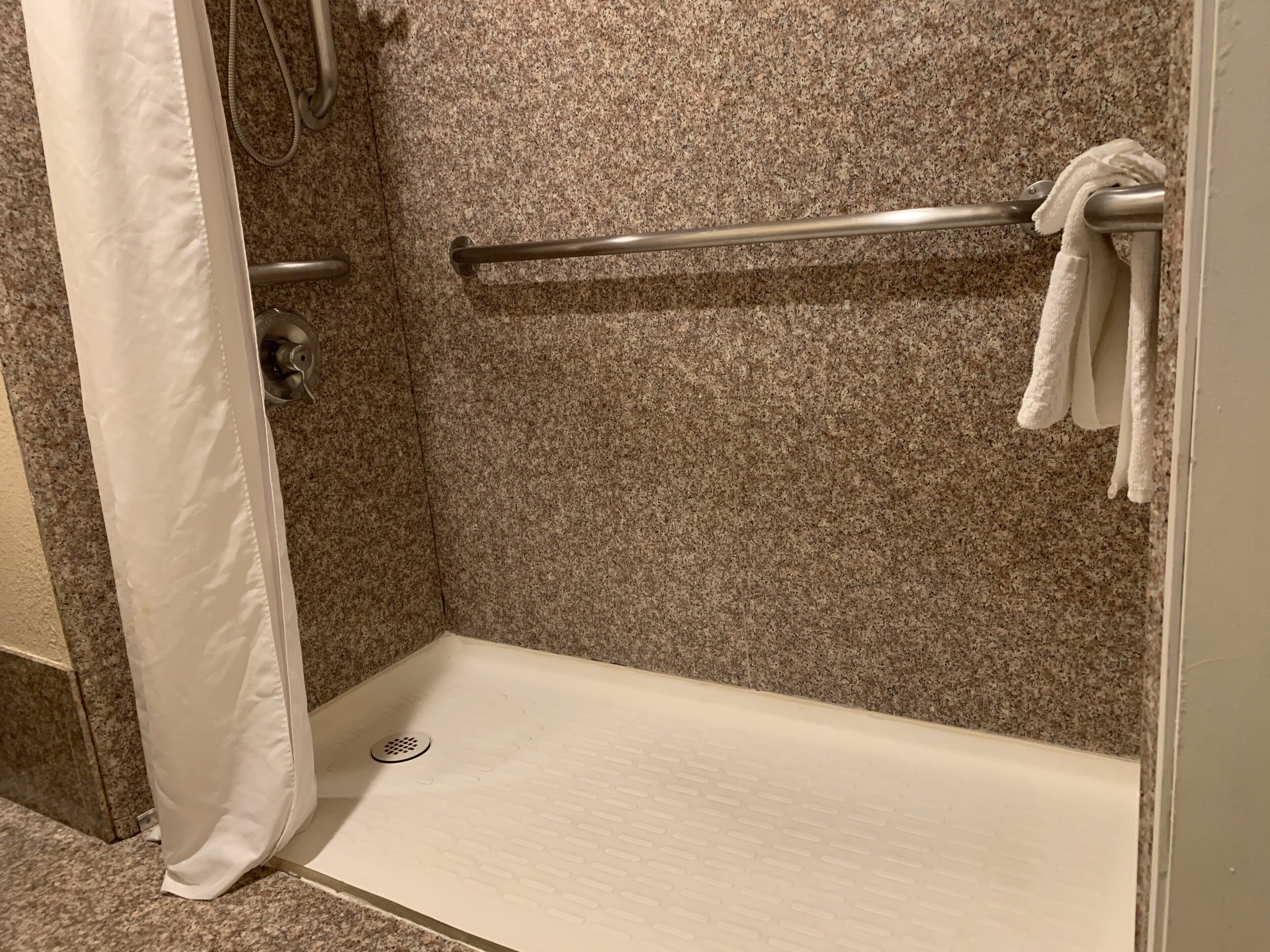 combined shower/bathtub, free toiletries, hair dryer, towels