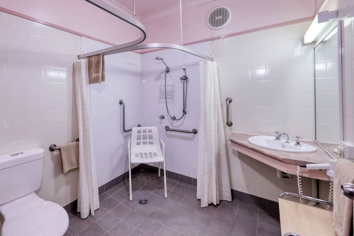 two-bedroom family suite with disability access | bathroom | shower, free toiletries, hair dryer, towels