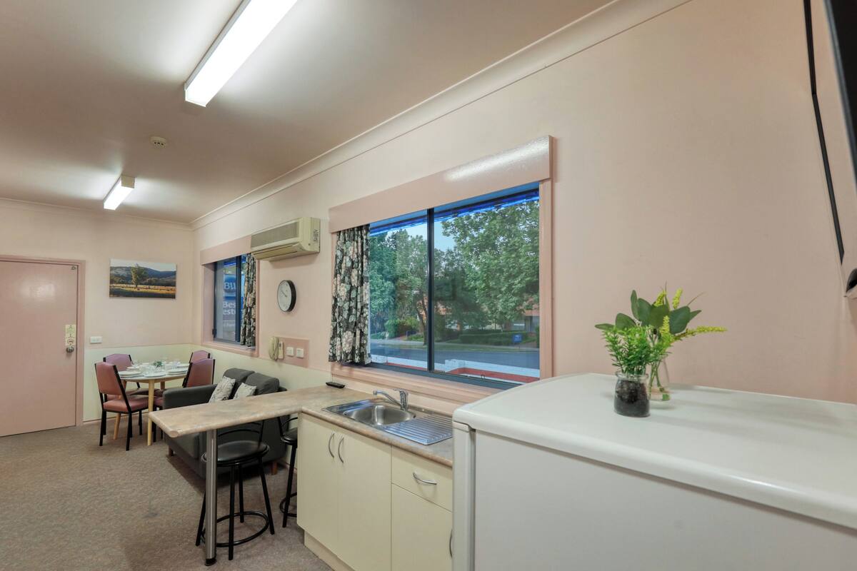 two-bedroom family suite with disability access | living area | led tv