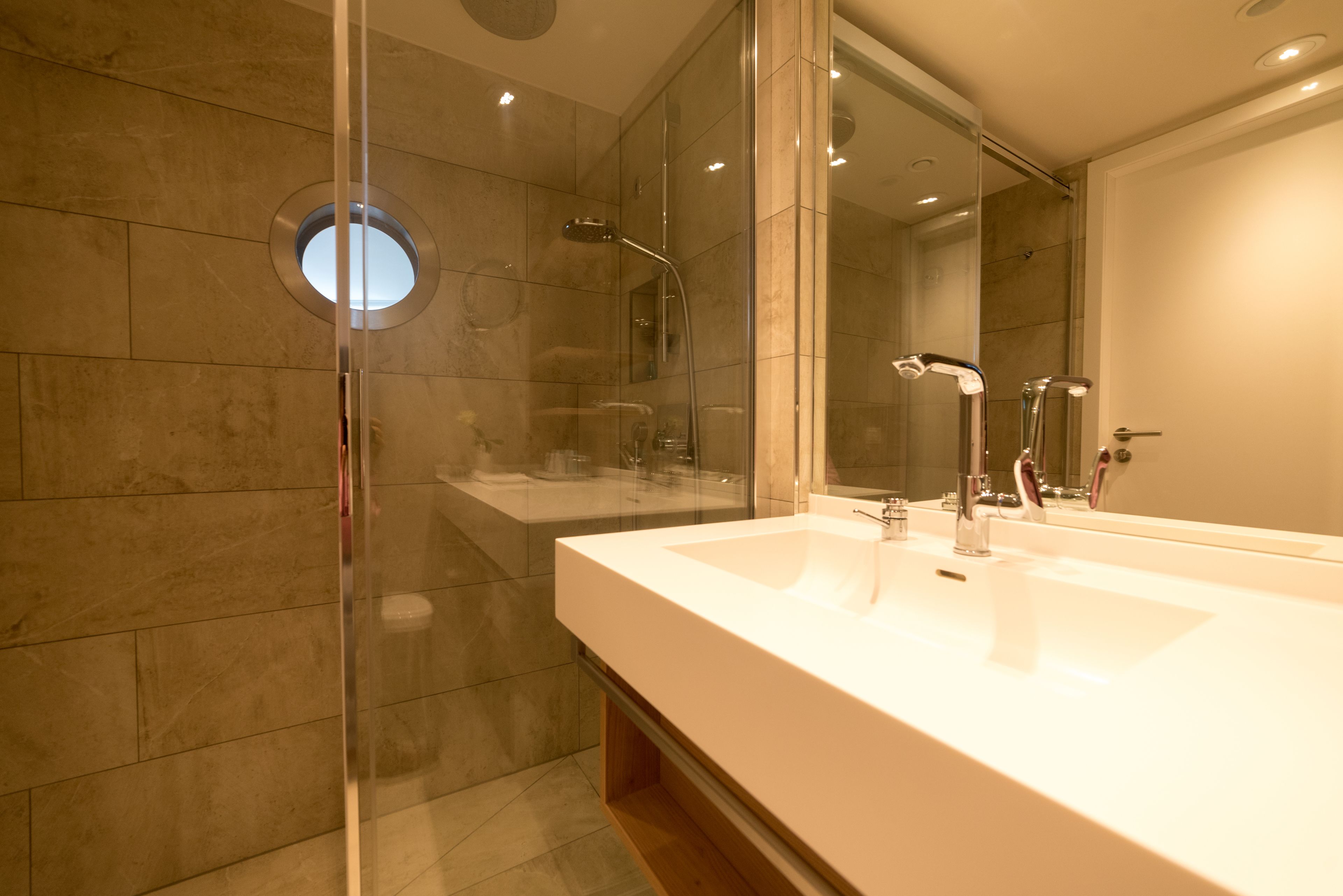 eco-friendly toiletries, hair dryer, bathrobes, slippers