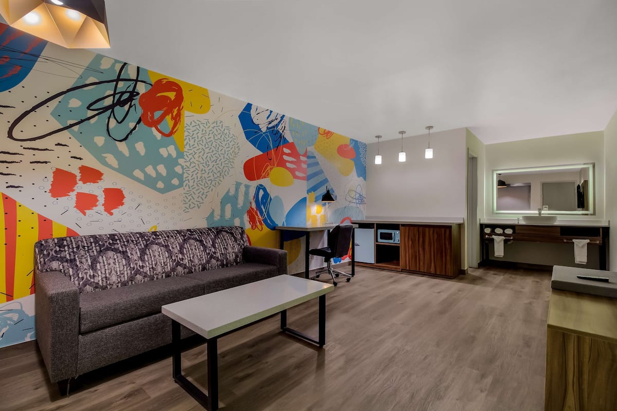 Suite, 1 King Bed, Non Smoking | 1 bedroom, pillowtop beds, desk, laptop workspace