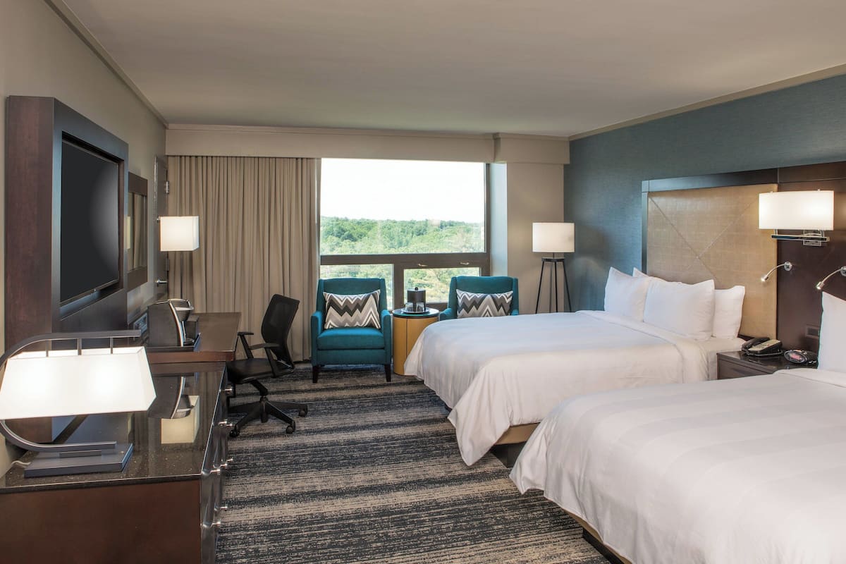 Premium bedding, down comforters, pillowtop beds, in-room safe
