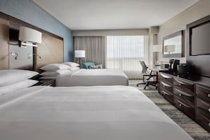 Premium bedding, down duvets, pillow-top beds, in-room safe
