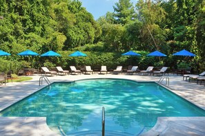 Indoor pool, outdoor pool, pool umbrellas, pool loungers