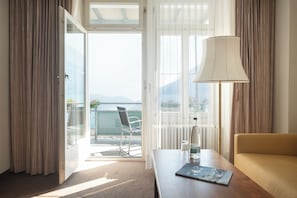 Junior Twin Room, Balcony, Lake View | Premium bedding, minibar, in-room safe, individually decorated
