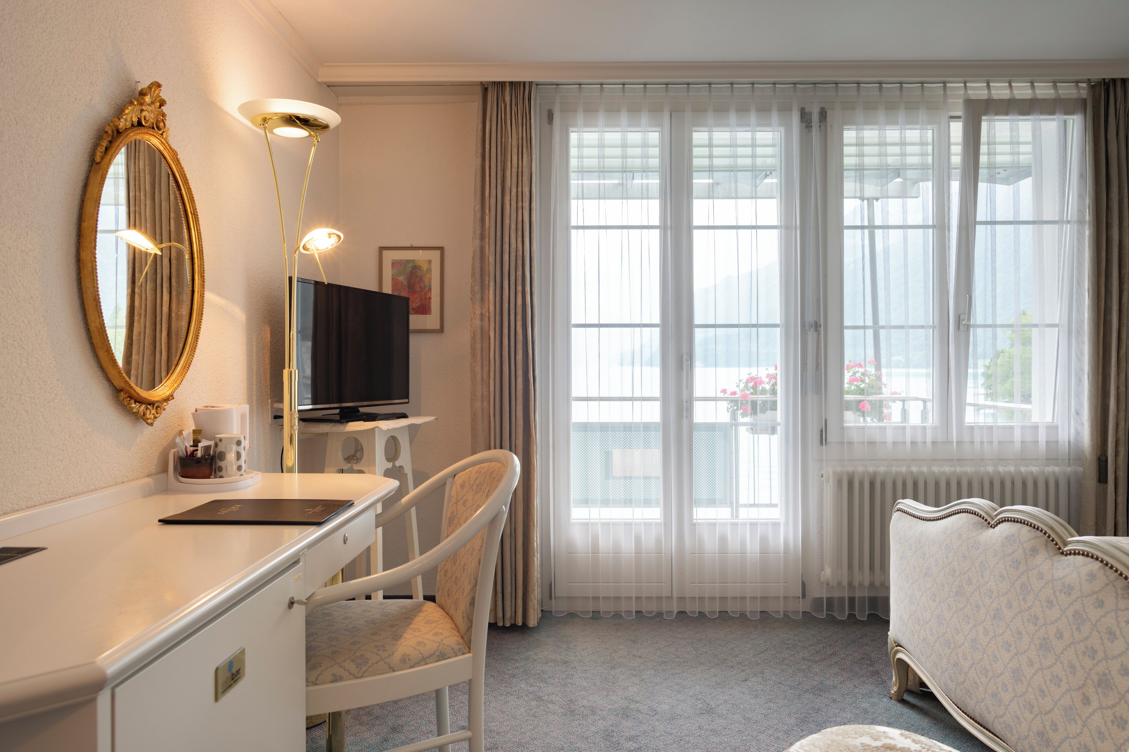 standard single room, balcony, lake view | 1 bedroom, premium bedding, minibar, in-room safe