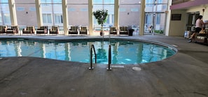 Indoor pool, open 7:00 AM to 10:00 PM, pool loungers