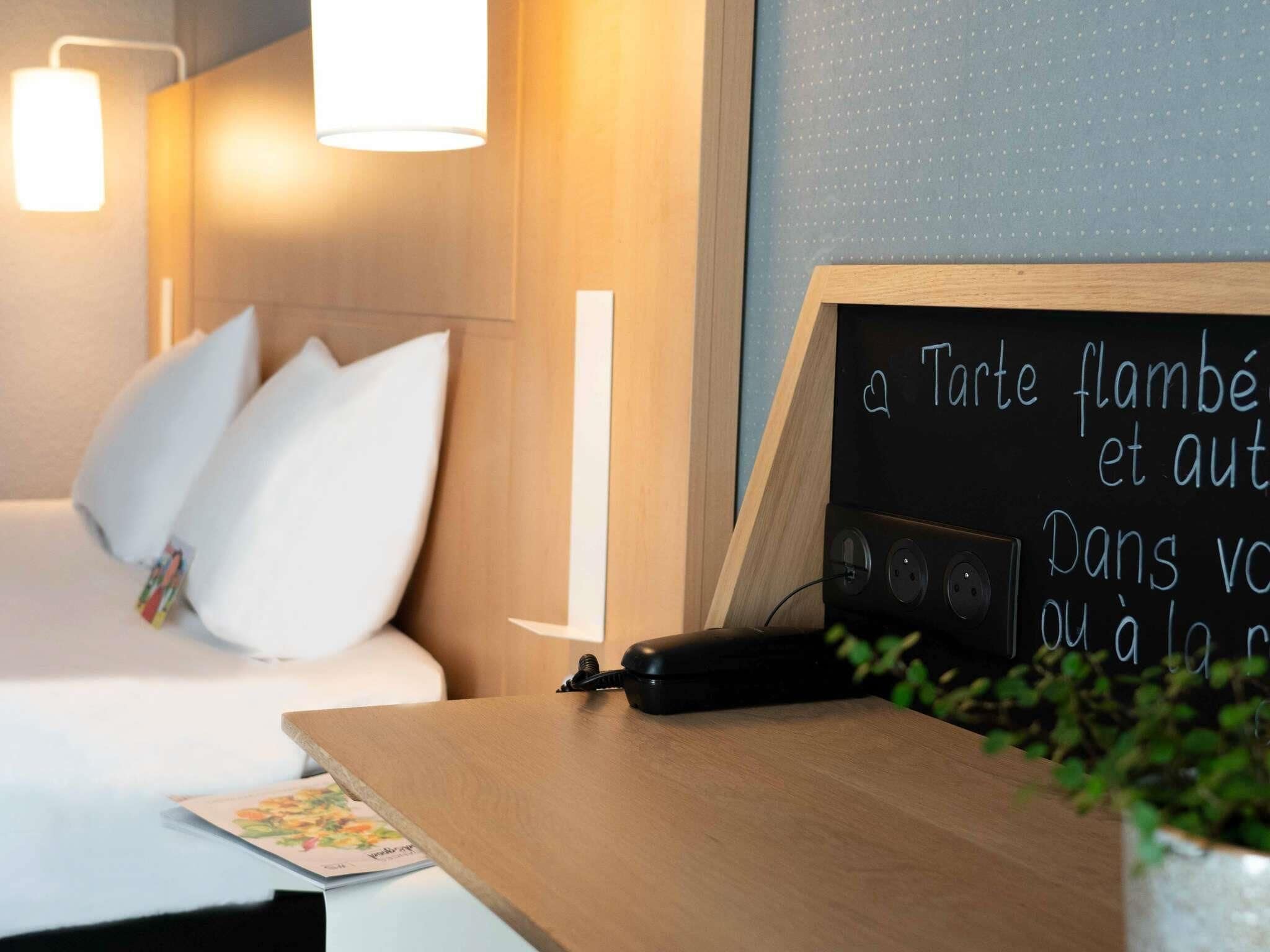 Desk, blackout drapes, soundproofing, iron/ironing board