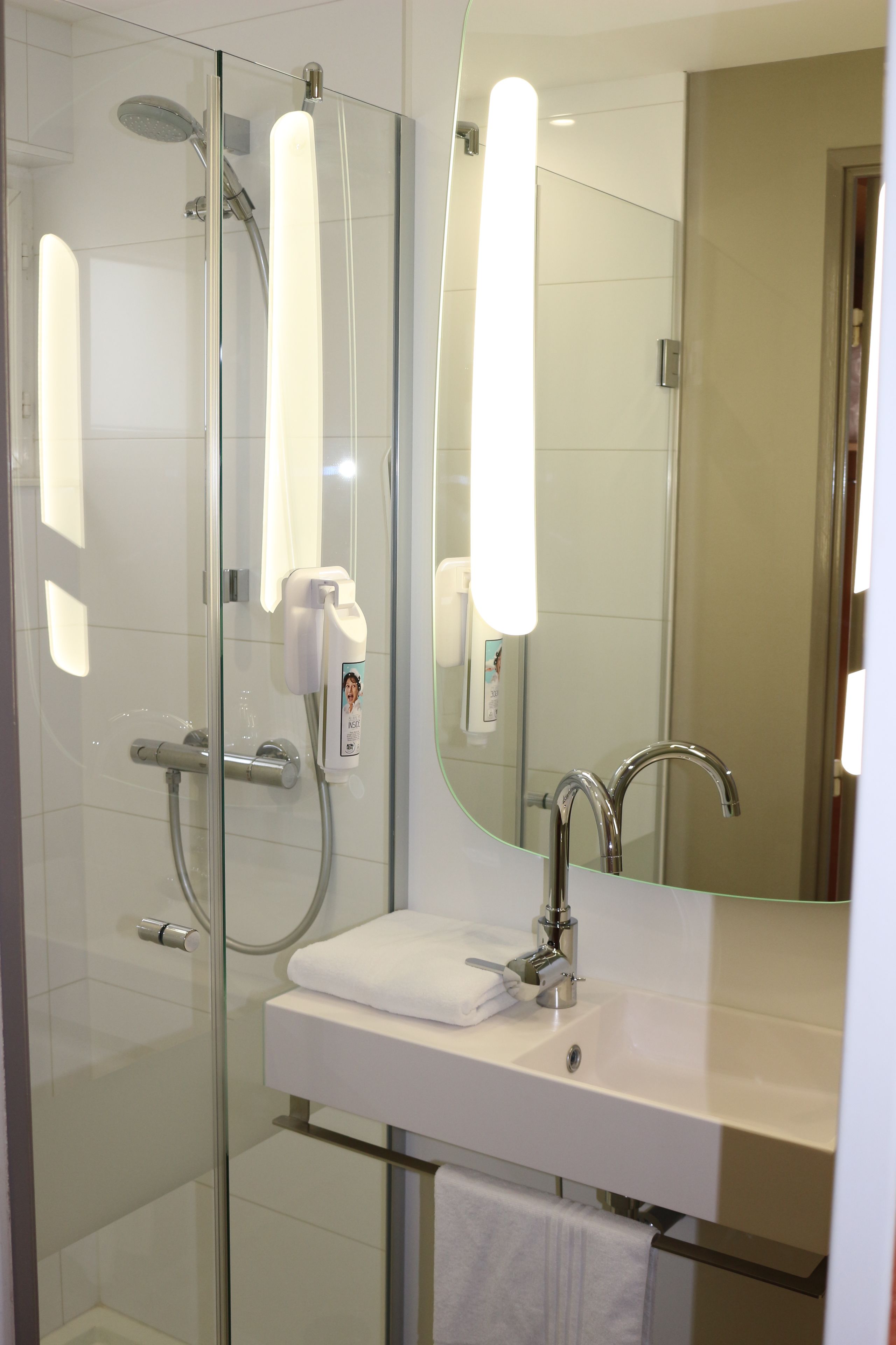 shower, eco-friendly toiletries, hair dryer, towels