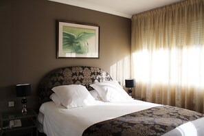 Premium bedding, individually furnished, desk, blackout curtains