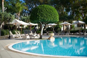 Indoor pool, outdoor pool, open 9:00 AM to 7:00 PM, pool umbrellas