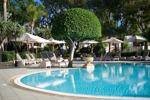 Indoor pool, outdoor pool, open 9:00 AM to 7:00 PM, pool umbrellas