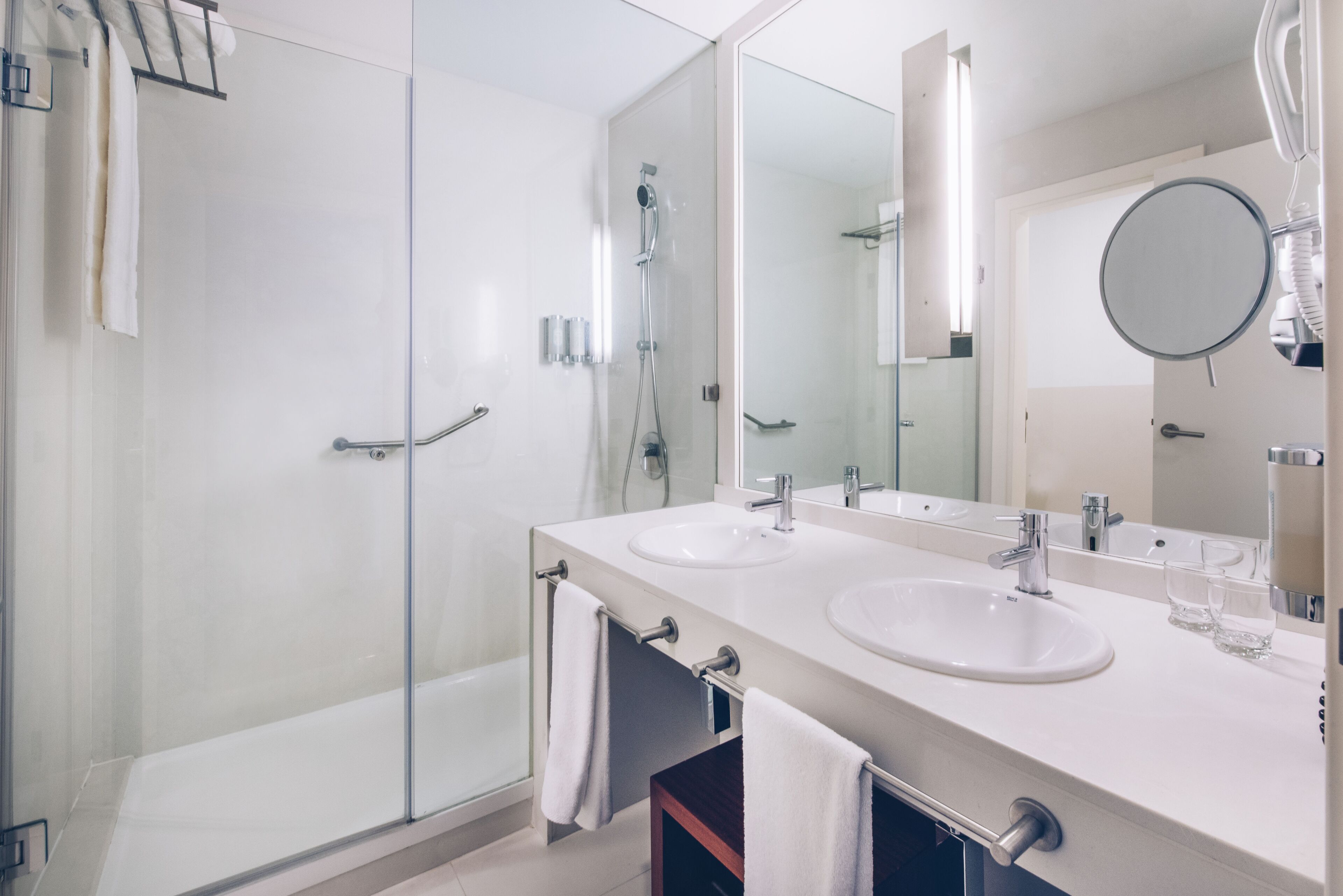 eco-friendly toiletries, hair dryer, bathrobes, slippers