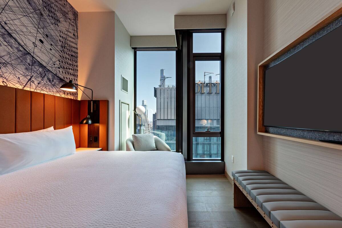Premium bedding, down comforters, in-room safe, desk