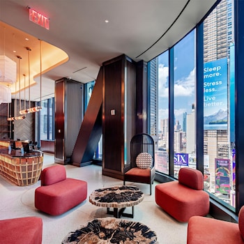 Hotel entrance and lobby at Tempo by Hilton New York Times Square