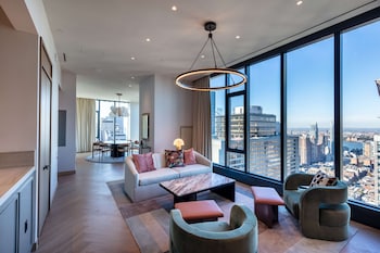 Kg Pres Ste Times Sq Vw Mobility Access RISHW | Living area | 65-inch Smart TV with cable channels, TV at Tempo by Hilton New York Times Square