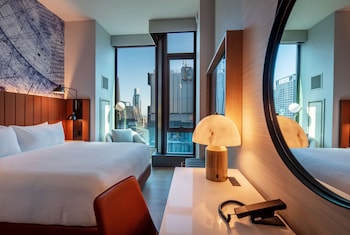 Premium bedding, down comforters, in-room safe, desk at Tempo by Hilton New York Times Square