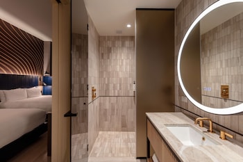 Shower, hair dryer, towels at Tempo by Hilton New York Times Square