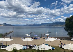 Private beach, white sand, sun-loungers, beach umbrellas