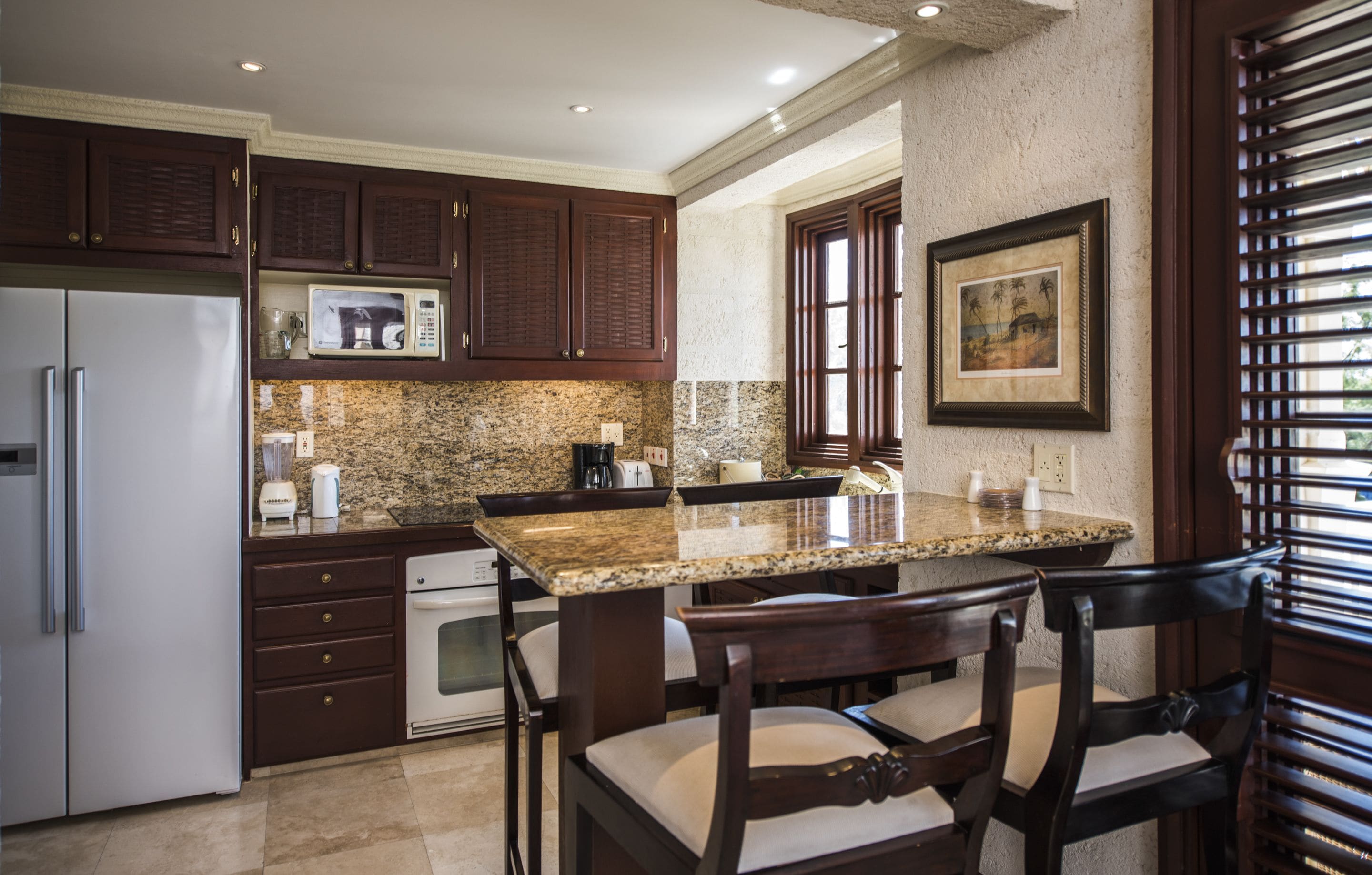 one bed standard penthouse with rooftop pool | private kitchen | full-sized fridge, microwave, cookware/dishes/utensils