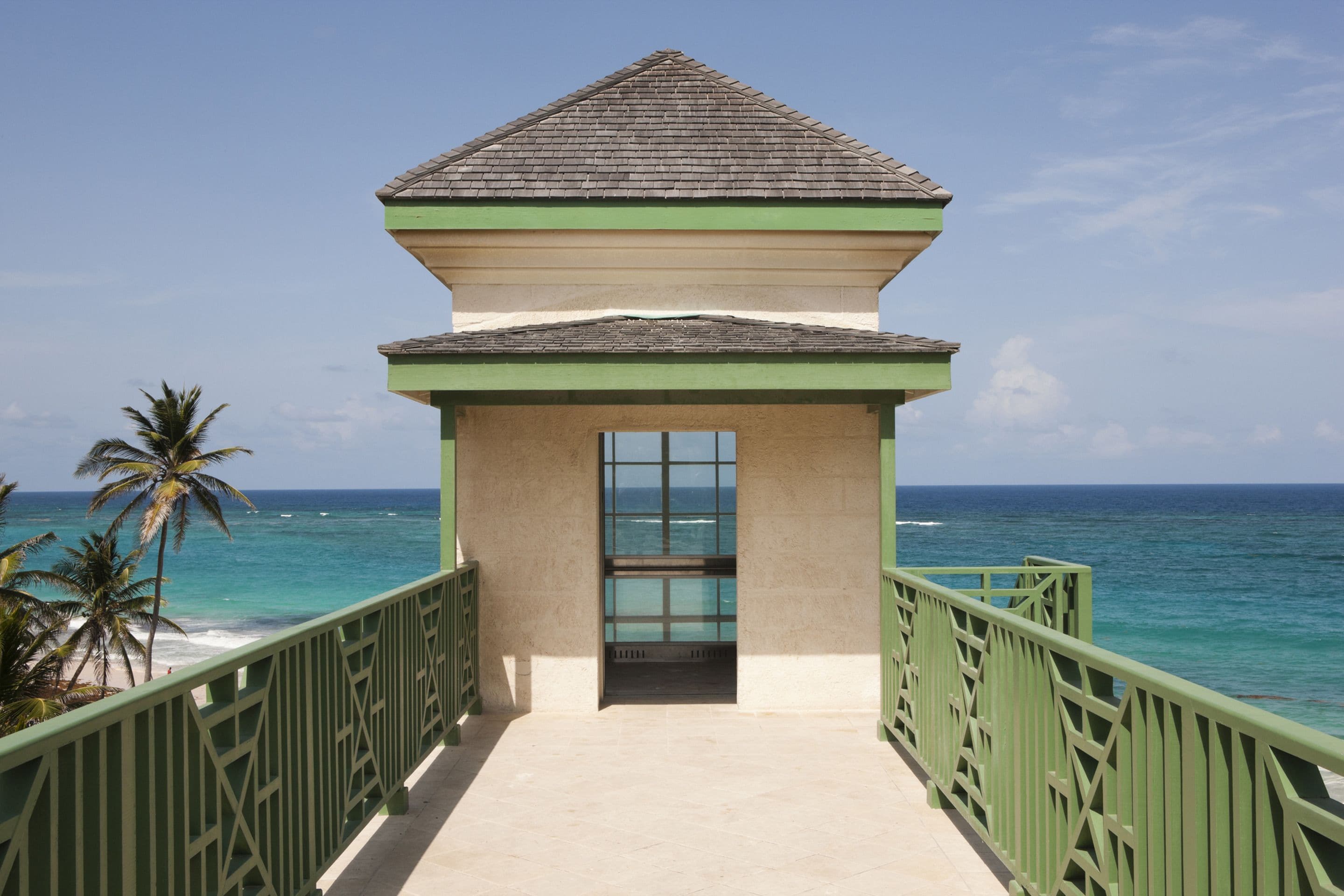 on the beach, white sand, beach towels, beach bar