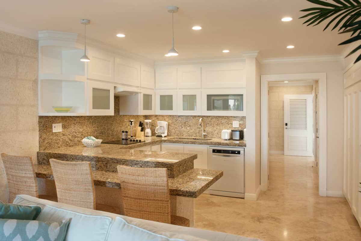 full-sized fridge, microwave, cookware/dishes/utensils