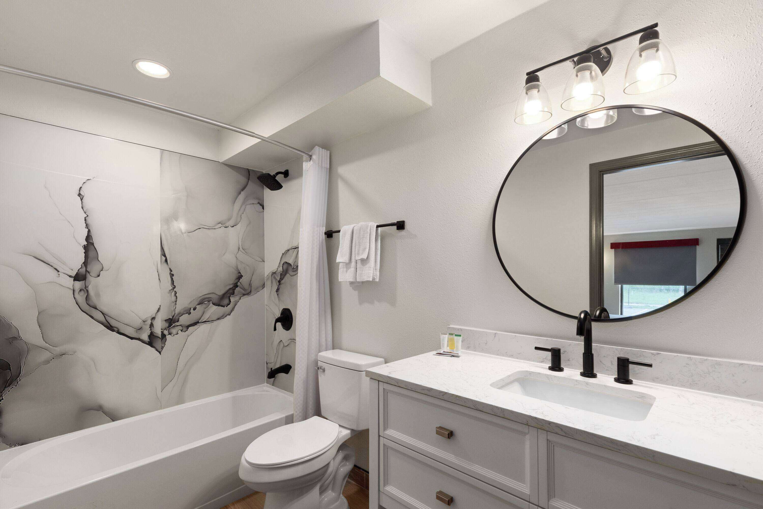 Suite, 1 King Bed with Sofa bed, Non Smoking | Bathroom | Shower, rainfall showerhead, hair dryer, towels