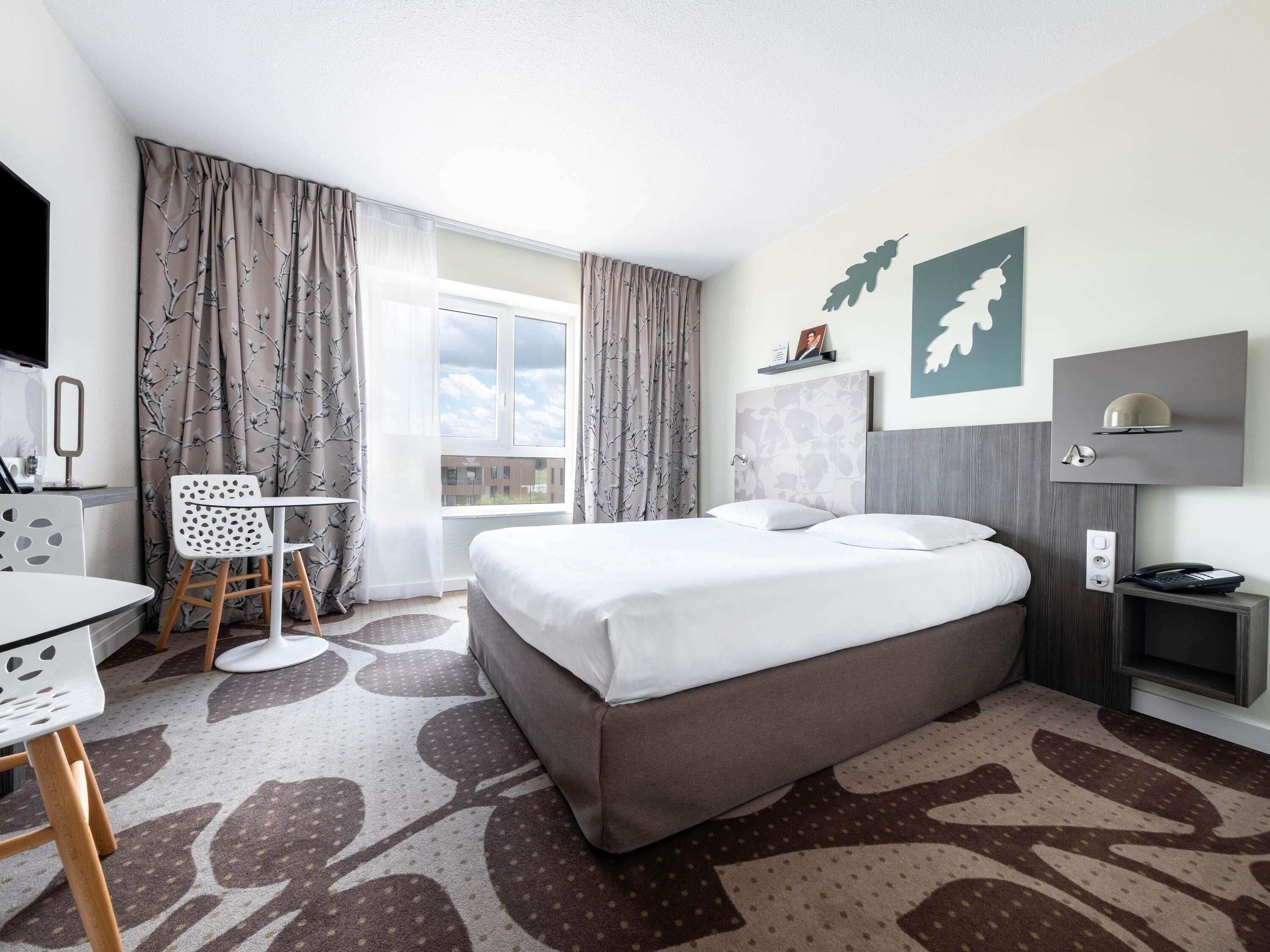 Ropa de cama de alta calidad y minibar 