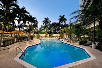 Outdoor pool, pool umbrellas, sun loungers