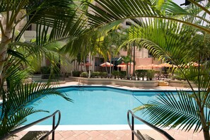 Outdoor pool, pool umbrellas, sun loungers