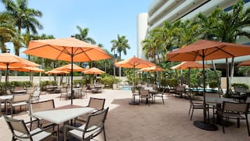 Outdoor pool, pool umbrellas, sun loungers