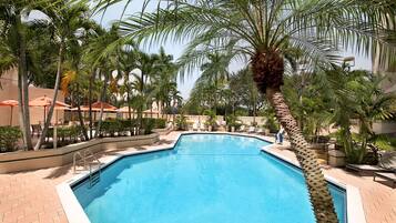 Outdoor pool, pool umbrellas, sun loungers