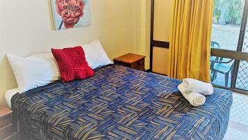 2 Bedroom Corporate Unit, Garden View | Laptop workspace, blackout drapes, iron/ironing board, free WiFi