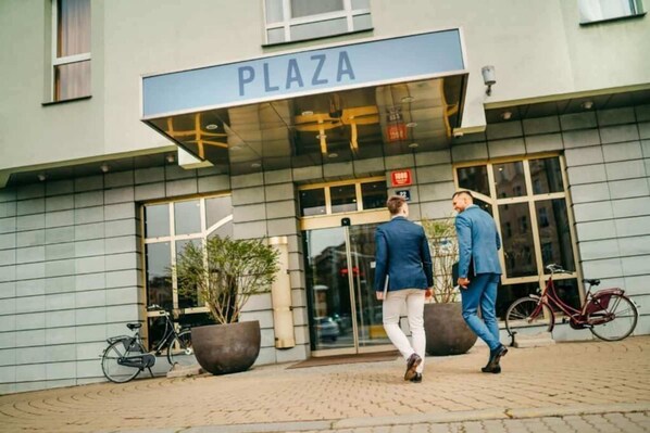 A building with a sign reading "PLAZA" above the entrance. - Plaza Boutique Hotel – Czech Leading Hotels (Prague)