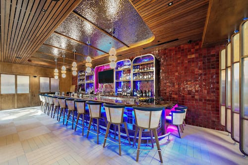 3 bars/lounges, rooftop bar