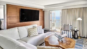 Club Suite, 2 Bedrooms | Living room | 55-inch Smart TV with cable channels, TV