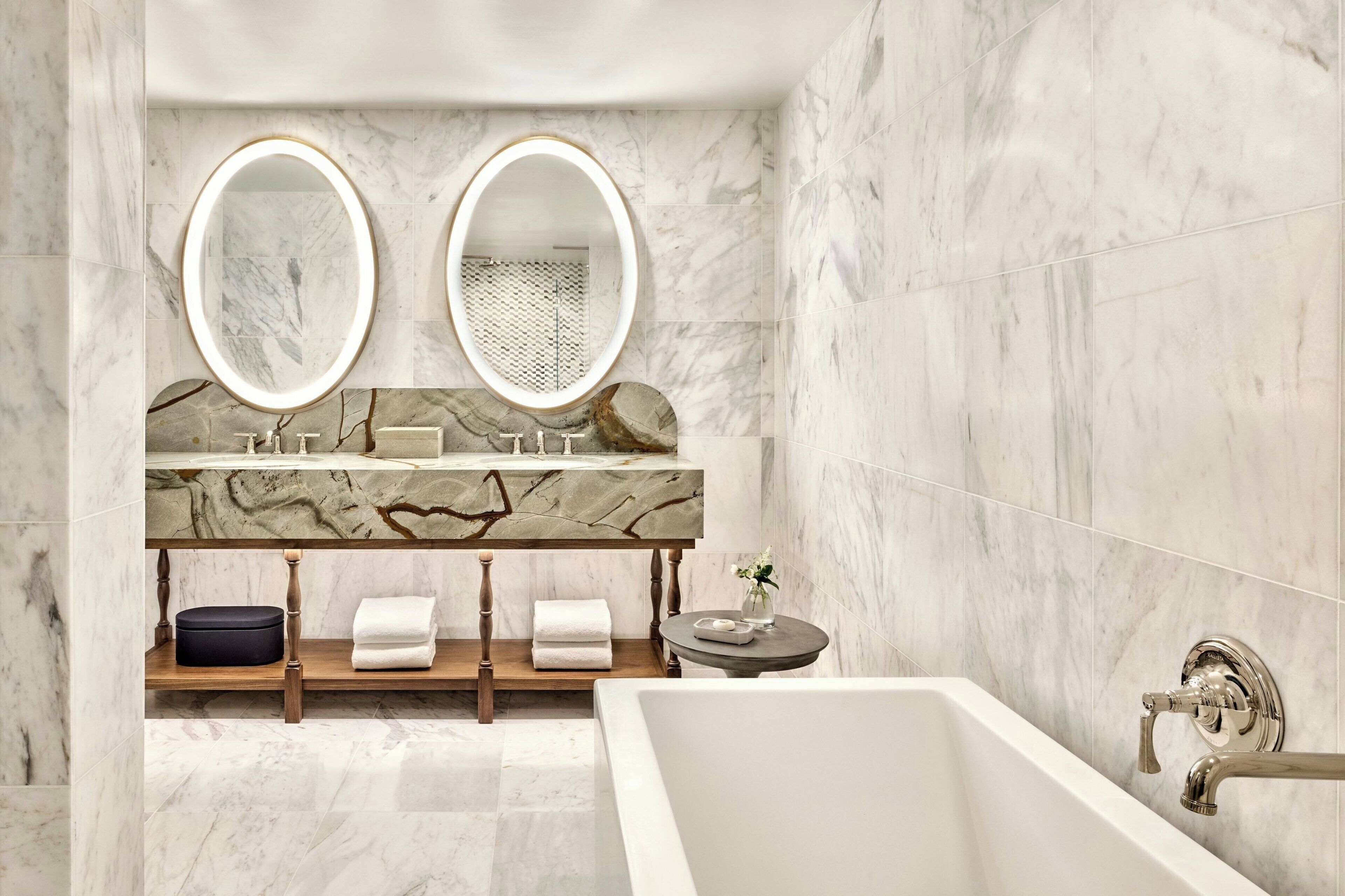 designer toiletries, hair dryer, bathrobes, slippers