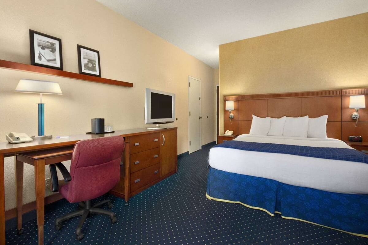 Premium bedding, down duvets, pillow-top beds, in-room safe