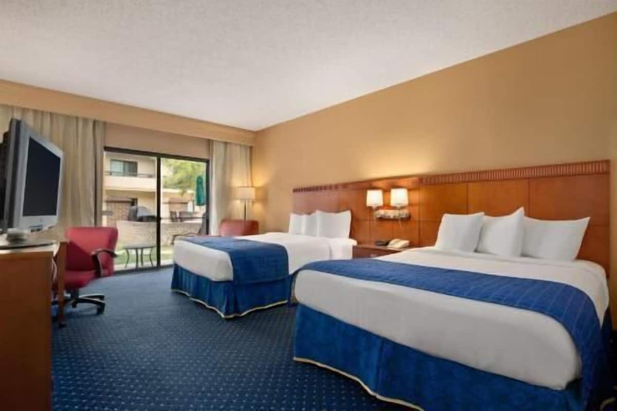 Premium bedding, down comforters, pillowtop beds, in-room safe