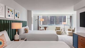 Hypo-allergenic bedding, down duvets, pillow-top beds, in-room safe