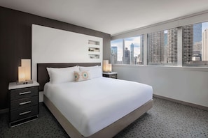 Hypo-allergenic bedding, down comforters, pillowtop beds, in-room safe