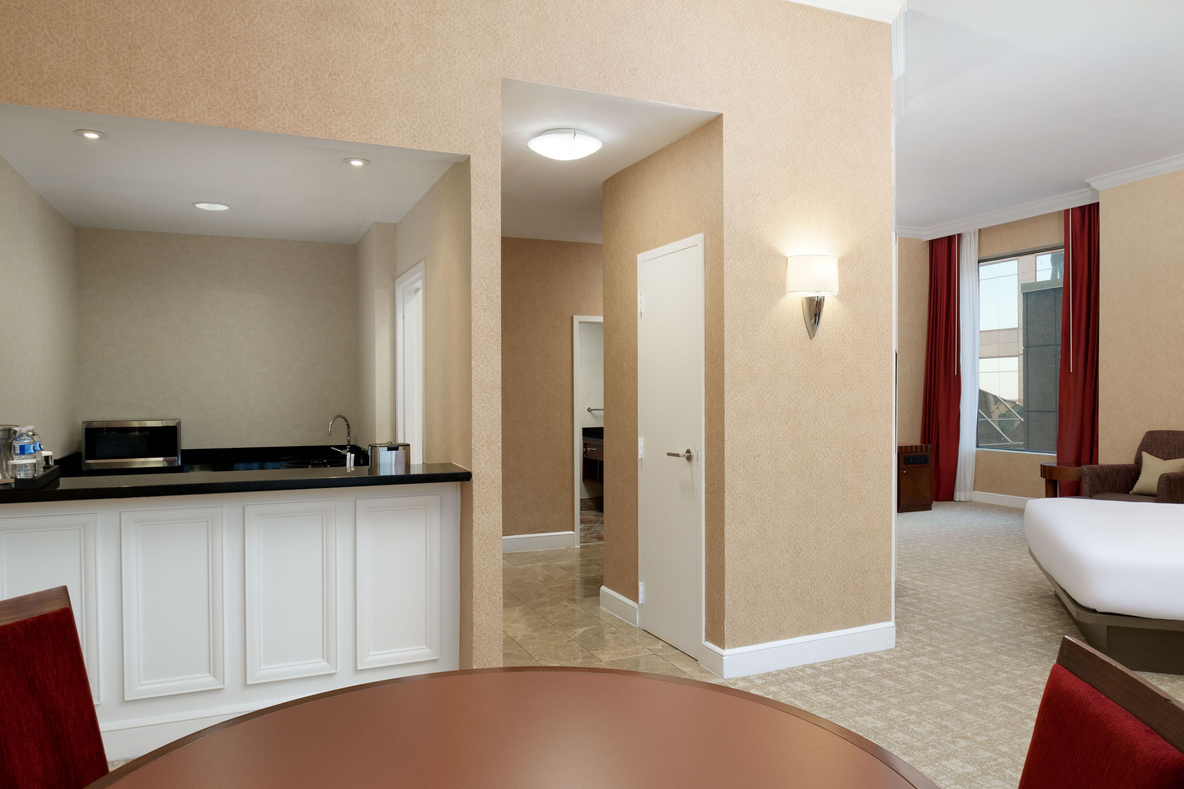 studio suite, 1 king bed, corner | living area | 55-inch lcd tv with cable channels, smart tv, pay films