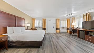 Suite, 1 King Bed, Non Smoking | Desk, iron/ironing board, free cots/infant beds, rollaway beds