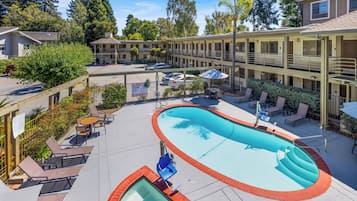 Outdoor pool, open 10:00 AM to 9:00 PM, pool umbrellas, sun loungers