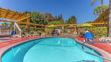 Outdoor pool, open 10:00 AM to 9:00 PM, pool umbrellas, sun loungers