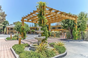 Outdoor pool, open 10:00 AM to 9:00 PM, pool umbrellas, sun loungers