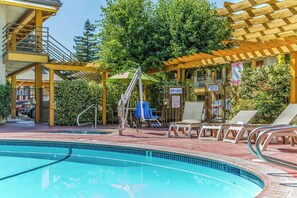Outdoor pool, open 10:00 AM to 9:00 PM, pool umbrellas, sun loungers