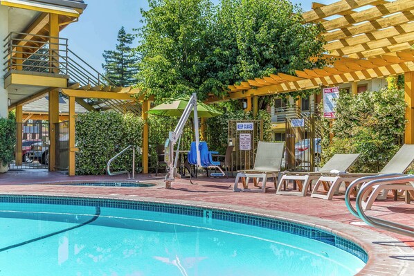Outdoor pool, open 10:00 AM to 9:00 PM, pool umbrellas, pool loungers