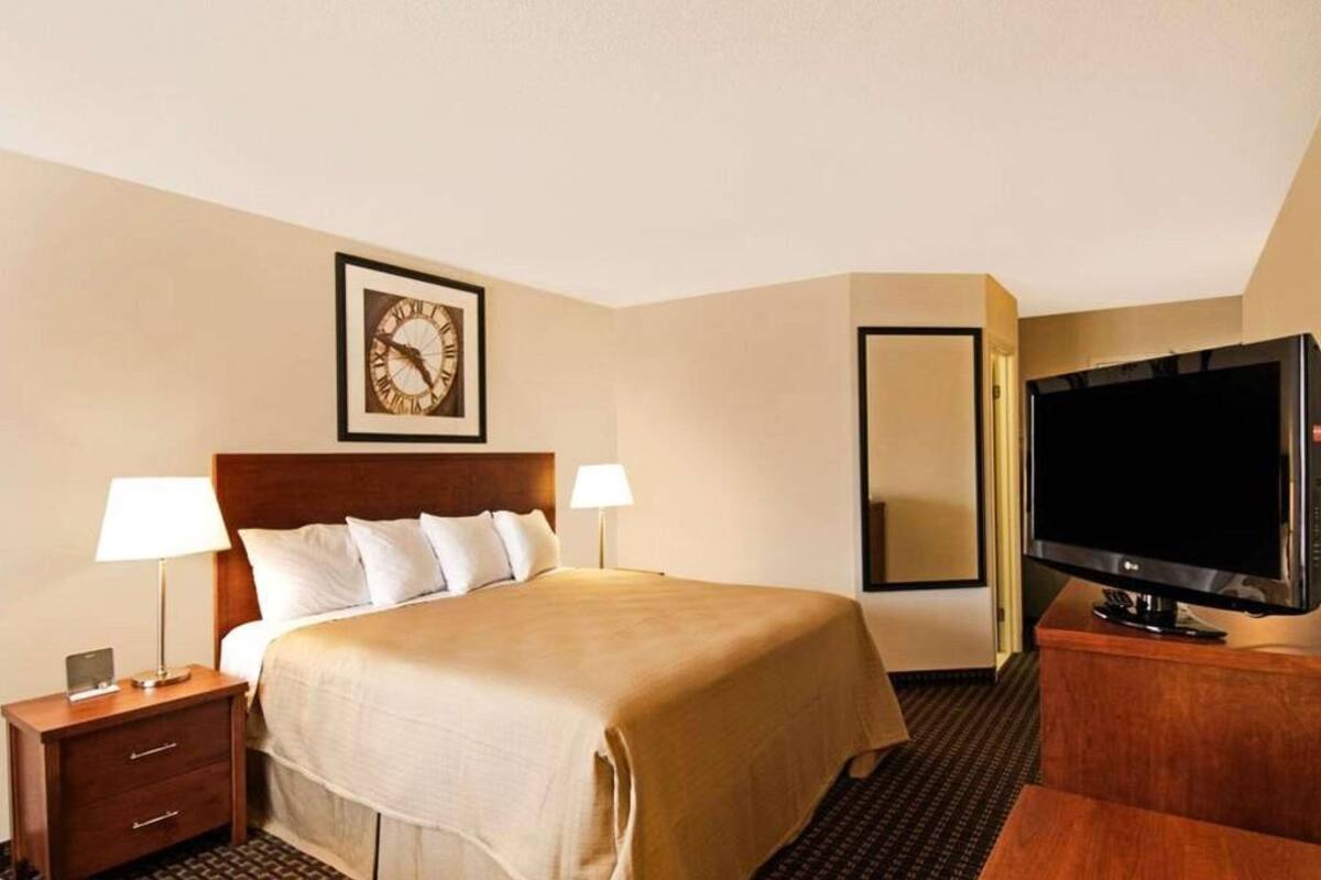 Pillowtop beds, desk, blackout drapes, iron/ironing board
