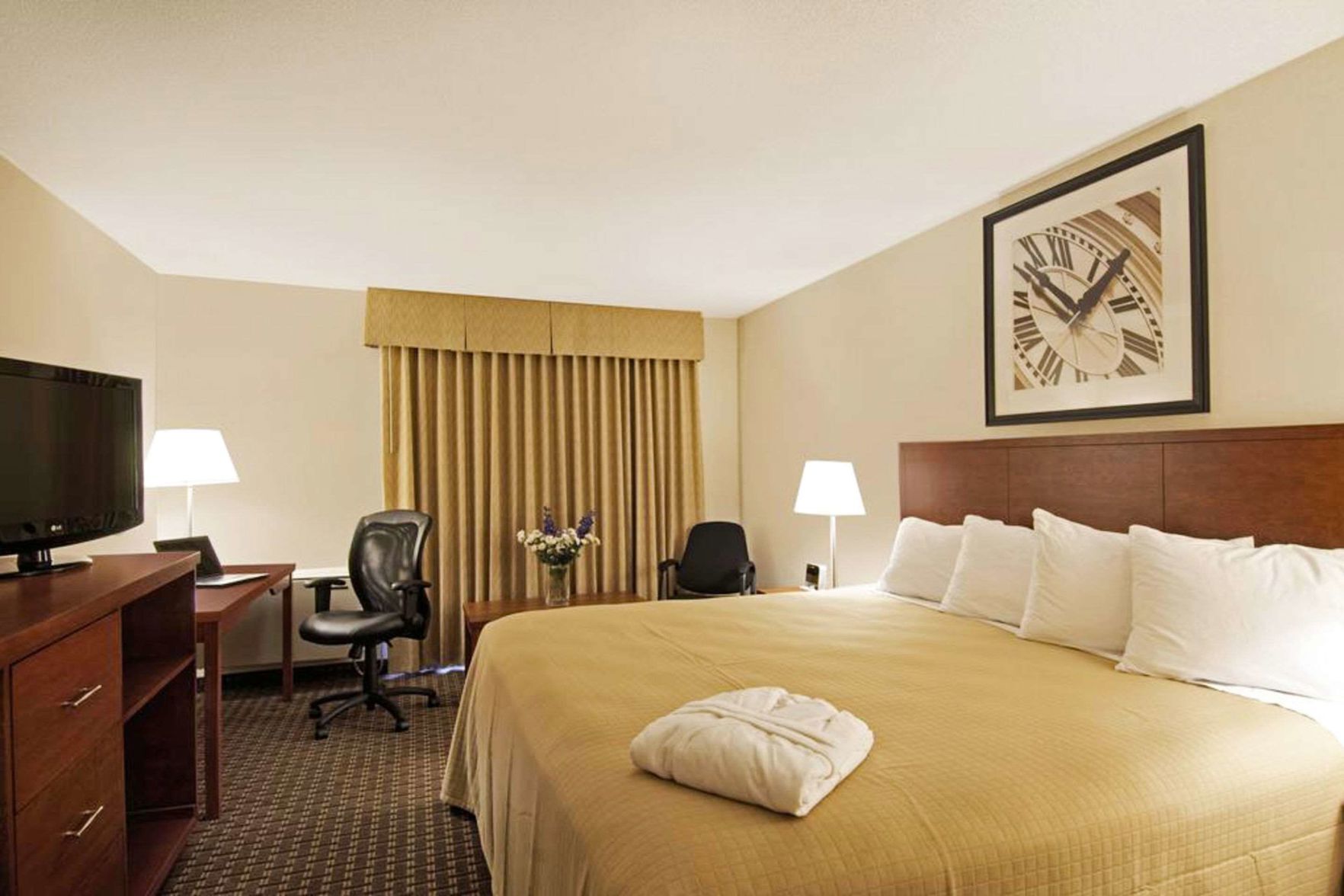 Pillowtop beds, desk, blackout drapes, iron/ironing board